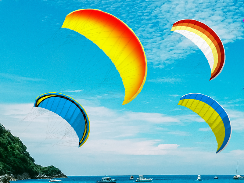 Colorful fashion fabric samples arranged in artistic display with vibrant patterns and textures