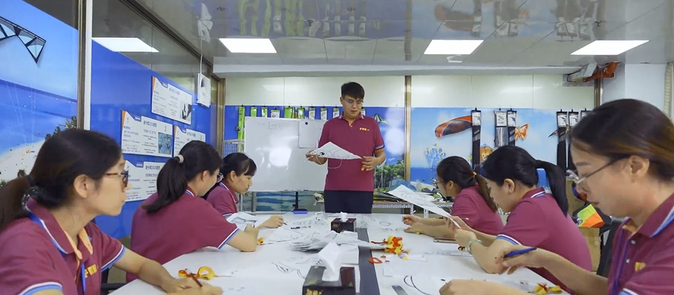 Logistics warehouse with textile shipments being loaded onto trucks with modern inventory management system